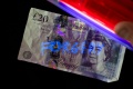 das Bild zu 'counterfeit money' auf Deutsch