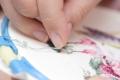 das Bild zu 'embroider' auf Deutsch